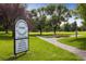 Image of Gunbarrel Commons showing sign, walking path, and lush landscaping at 6251 Willow Ln, Boulder, CO 80301