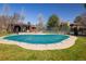 Inviting community pool with cover, gazebo, and nearby hot tub and mature trees at 6251 Willow Ln, Boulder, CO 80301