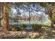 Community tennis court surrounded by trees and greenery at 6251 Willow Ln, Boulder, CO 80301