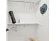 Neatly organized closet with shelves, rods, and space for personal items at 5128 W 26Th Ave # 207, Denver, CO 80212
