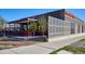 Exterior of Cochino Taco restaurant with a stylish facade, outdoor seating area, and modern architectural details at 5128 W 26Th Ave # 207, Denver, CO 80212