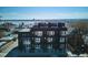 Modern apartment building with balconies offers a blend of contemporary design and urban living, set against a scenic backdrop at 5128 W 26Th Ave # 207, Denver, CO 80212