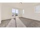 Bright bedroom with neutral carpet, large sliding door and natural lighting at 39876 Floyd St, Elizabeth, CO 80107