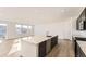 Open kitchen featuring a center island, stainless steel appliances, and recessed lighting at 39876 Floyd St, Elizabeth, CO 80107