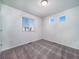 Bright bedroom with carpet, window blinds, and neutral walls at 45004 Sunflower Ln, Bennett, CO 80102