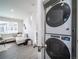 Stackable washer and dryer in a laundry closet at 45004 Sunflower Ln, Bennett, CO 80102