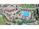 Aerial view of the community pool, spa, and outdoor seating area at 9592 Firenze Way, Highlands Ranch, CO 80126