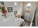 Dramatic two-story foyer with staircase, chandelier, and decorative touches creating a grand entry at 9592 Firenze Way, Highlands Ranch, CO 80126