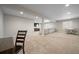 Finished basement offers ample space for recreation, complete with a media area and dining area at 17670 W 94Th Dr, Arvada, CO 80007