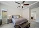 Main bedroom suite has carpet floors and ensuite bath at 17670 W 94Th Dr, Arvada, CO 80007