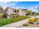 Beautiful single-Gathering home with manicured lawn, stone accents, and an attached garage at 17670 W 94Th Dr, Arvada, CO 80007
