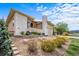 Charming home featuring stone accents, manicured landscaping and a welcoming entrance, offering great curb appeal at 17670 W 94Th Dr, Arvada, CO 80007