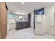 Well-lit bathroom with double vanity, modern fixtures, a glass enclosed shower, and ample counter space at 13211 W 32Nd Ave, Golden, CO 80401