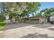 Exterior view of house with long driveway and a two car garage at 13211 W 32Nd Ave, Golden, CO 80401