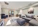 Spacious living room with a cozy seating area, ample natural light, and stylish decor, great for entertaining at 13211 W 32Nd Ave, Golden, CO 80401