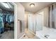 Bathroom with a shower and tub, and a walk-in closet at 2973 E 135Th Way, Thornton, CO 80241