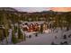 Luxury home nestled in a winter mountain setting at 127 Windwood Cir, Breckenridge, CO 80424