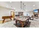 Basement recreation room with pool table, foosball, and fireplace at 127 Windwood Cir, Breckenridge, CO 80424