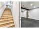 Basement stairs leading to additional rooms at 127 Windwood Cir, Breckenridge, CO 80424