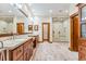 Elegant bathroom with double sinks, a large shower, and plenty of light at 127 Windwood Cir, Breckenridge, CO 80424