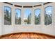 Bright bedroom with hardwood floors and mountain views at 127 Windwood Cir, Breckenridge, CO 80424