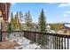 Private deck with mountain views and snowy landscape at 127 Windwood Cir, Breckenridge, CO 80424