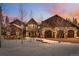 Mountain home exterior with stone and wood accents at 127 Windwood Cir, Breckenridge, CO 80424