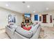 Cozy Gathering room with a fireplace and comfortable seating at 127 Windwood Cir, Breckenridge, CO 80424