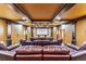 Home theater with large screen and comfortable seating at 127 Windwood Cir, Breckenridge, CO 80424