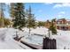 Hot tub with mountain views and snowy landscape at 127 Windwood Cir, Breckenridge, CO 80424