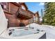 Hot tub on back patio with mountain views at 127 Windwood Cir, Breckenridge, CO 80424
