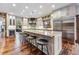 Spacious kitchen with island, stainless steel appliances at 127 Windwood Cir, Breckenridge, CO 80424