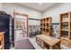 Laundry room with built in storage and bench at 127 Windwood Cir, Breckenridge, CO 80424