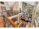 Open-concept living area with a stone fireplace and high ceilings at 127 Windwood Cir, Breckenridge, CO 80424