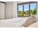 Bright bedroom featuring beautiful natural light from the large windows at 13390 W Warren Ave, Lakewood, CO 80228