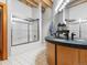Bathroom featuring a custom vanity, a large mirror, and a glass-enclosed shower at 1792 Wynkoop St # 508, Denver, CO 80202