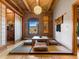 Bedroom featuring exposed brick wall, tatami mats, and shoji screen doors at 1792 Wynkoop St # 508, Denver, CO 80202