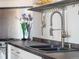 Close-up of the kitchen sink with stainless steel fixtures and a modern design at 1792 Wynkoop St # 508, Denver, CO 80202