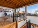 Bright living room featuring hardwood floors, an industrial ceiling, and access to a deck at 1792 Wynkoop St # 508, Denver, CO 80202