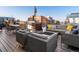 Inviting rooftop deck features outdoor seating, a grill, and a cozy fire pit, ideal for entertaining and relaxation at 1792 Wynkoop St # 508, Denver, CO 80202
