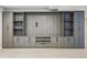 Basement media built-in with cabinets and shelving in a spacious area at 6273 Torrey Ln, Arvada, CO 80403