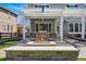 Outdoor patio with a pergola, built-in grill, comfortable seating, and a cozy fire pit at 6273 Torrey Ln, Arvada, CO 80403