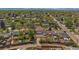 Wide aerial view of the neighborhood with mature landscaping, charming homes, and tree-lined streets at 716 S Osage, Denver, CO 80223