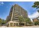 The Lido Condominiums with balconies and trees, with street view and blue sky at 790 N Washington St # 1003, Denver, CO 80203