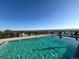 Rooftop pool features lounge chairs and panoramic city views at 790 N Washington St # 1003, Denver, CO 80203