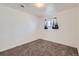 Bright bedroom with a window and unique curtains for natural light and added comfort at 828 S Osceola St, Denver, CO 80219