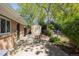 Backyard featuring a storage shed, surrounded by greenery and a partial fence, offering a private outdoor space at 1522 Utah St, Golden, CO 80401