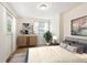 Cozy bedroom with large windows and neutral decor at 1522 Utah St, Golden, CO 80401