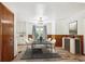 Elegant dining room featuring stylish seating, modern lighting, and an open view to the kitchen at 1522 Utah St, Golden, CO 80401