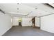 Spacious garage with high ceilings, updated lighting, and ample room for parking and storage at 1522 Utah St, Golden, CO 80401